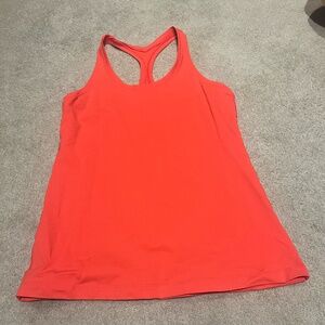 Lululemon razor back tank top, size 12, orange/red
